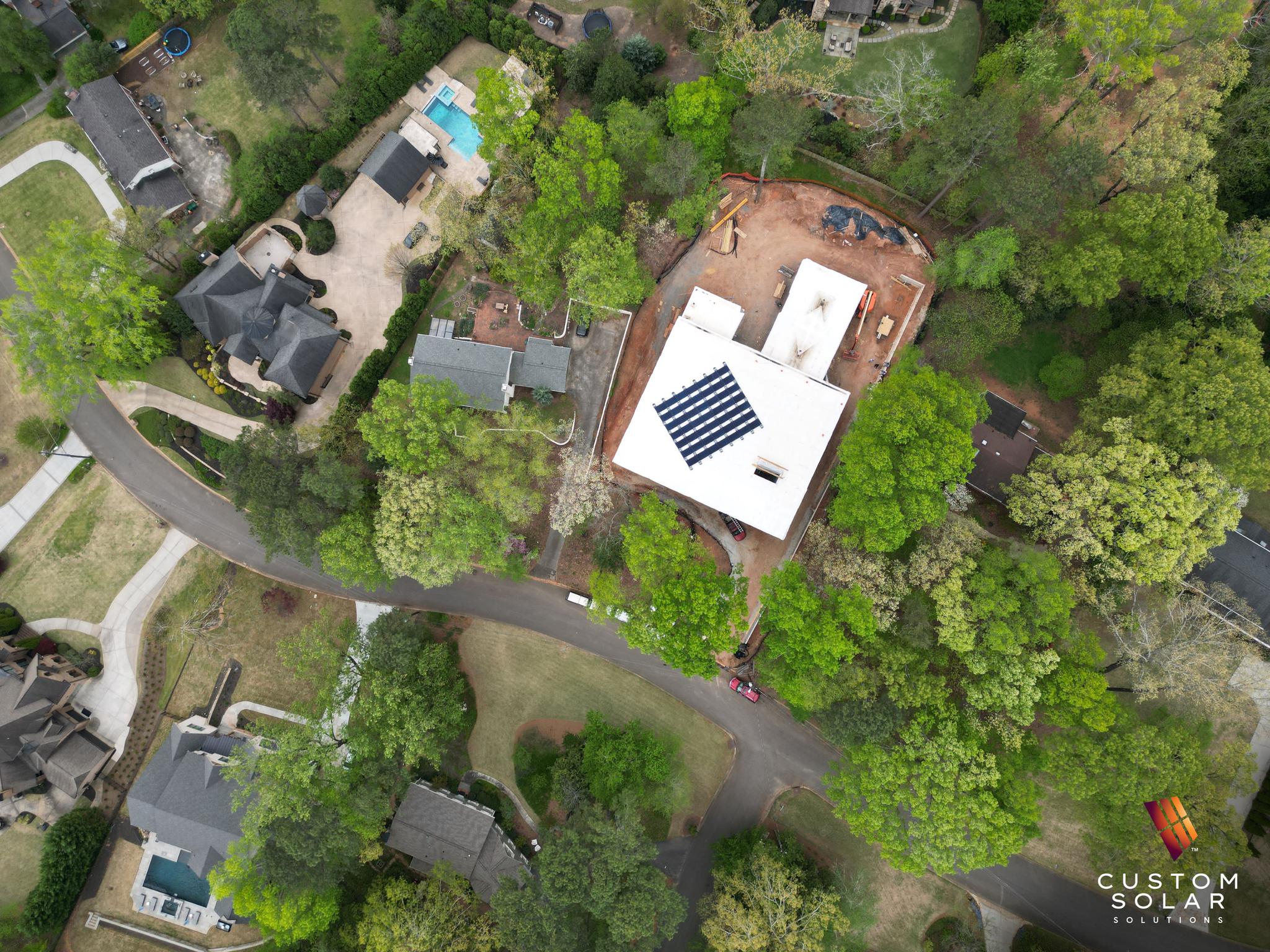 New Residential Construction on Flat Roof Installation by Custom Solar Solutions