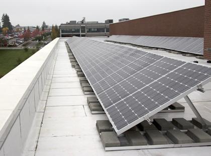 Everett Community College Liberty Hall funded by SnoPUD Planet Power. Ballasted racking for flat roof.