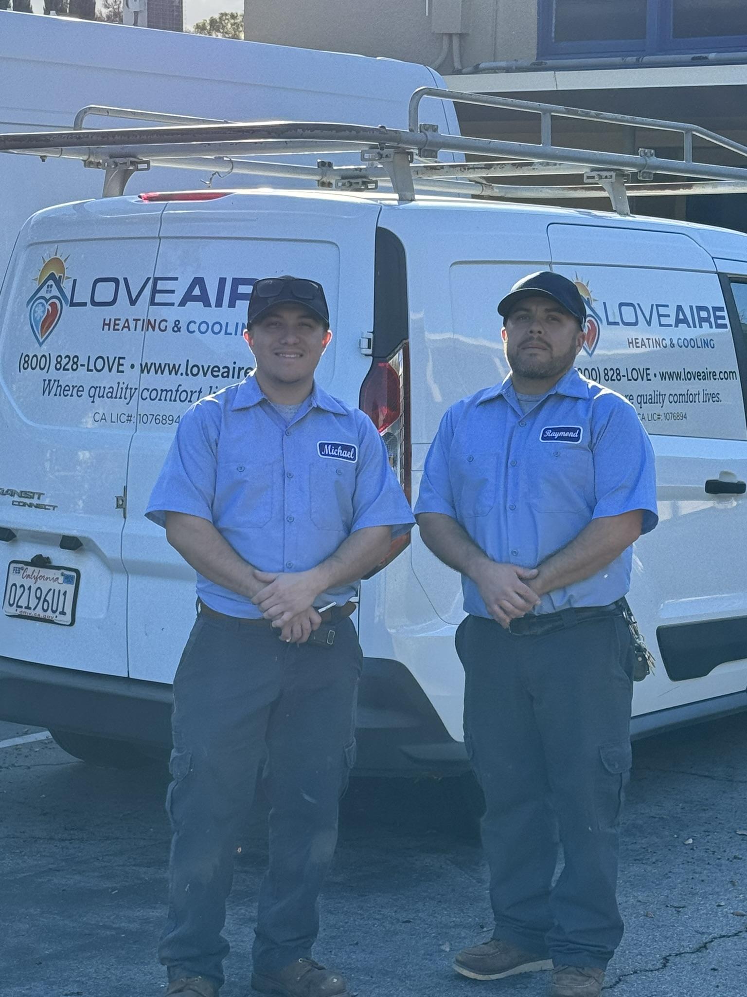 Owners Raymond and Michael side by side while servicing a local school district.