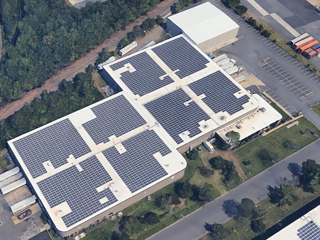 Rooftop solar paired with a roof replacement to reduce operating expenses and extend asset life.