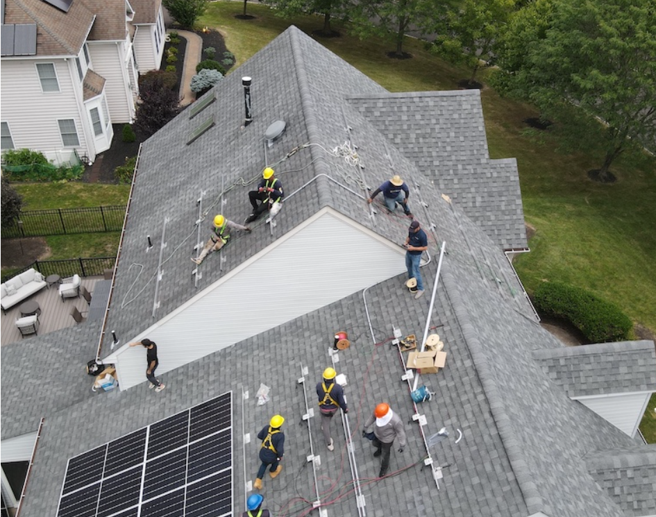 Teamwork at new heights! Bringing solar power to homes, together.