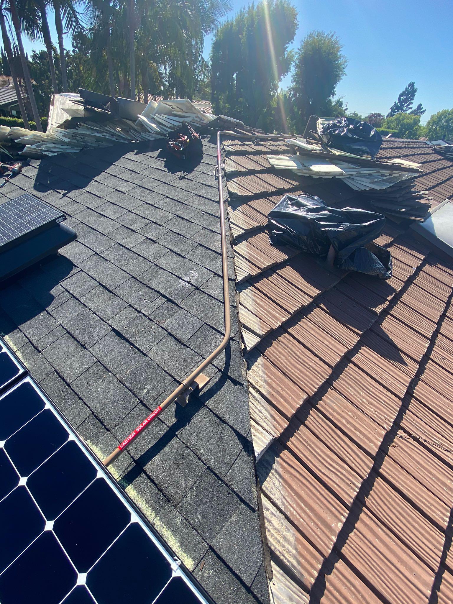 Beginning phase of installing on a metal roof - Santa Ana, CA
