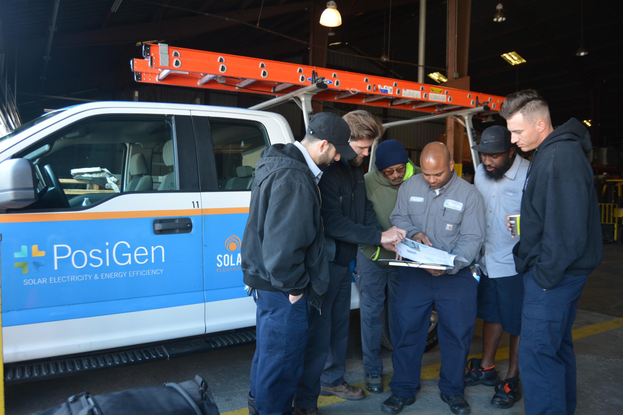 Our work crew reviewing job notes.