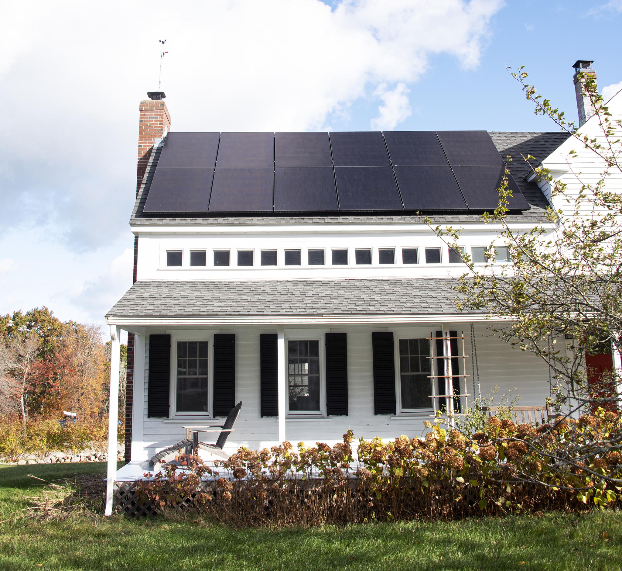All-black Solaria solar panel installation on a farmhouse in Scituate, MA