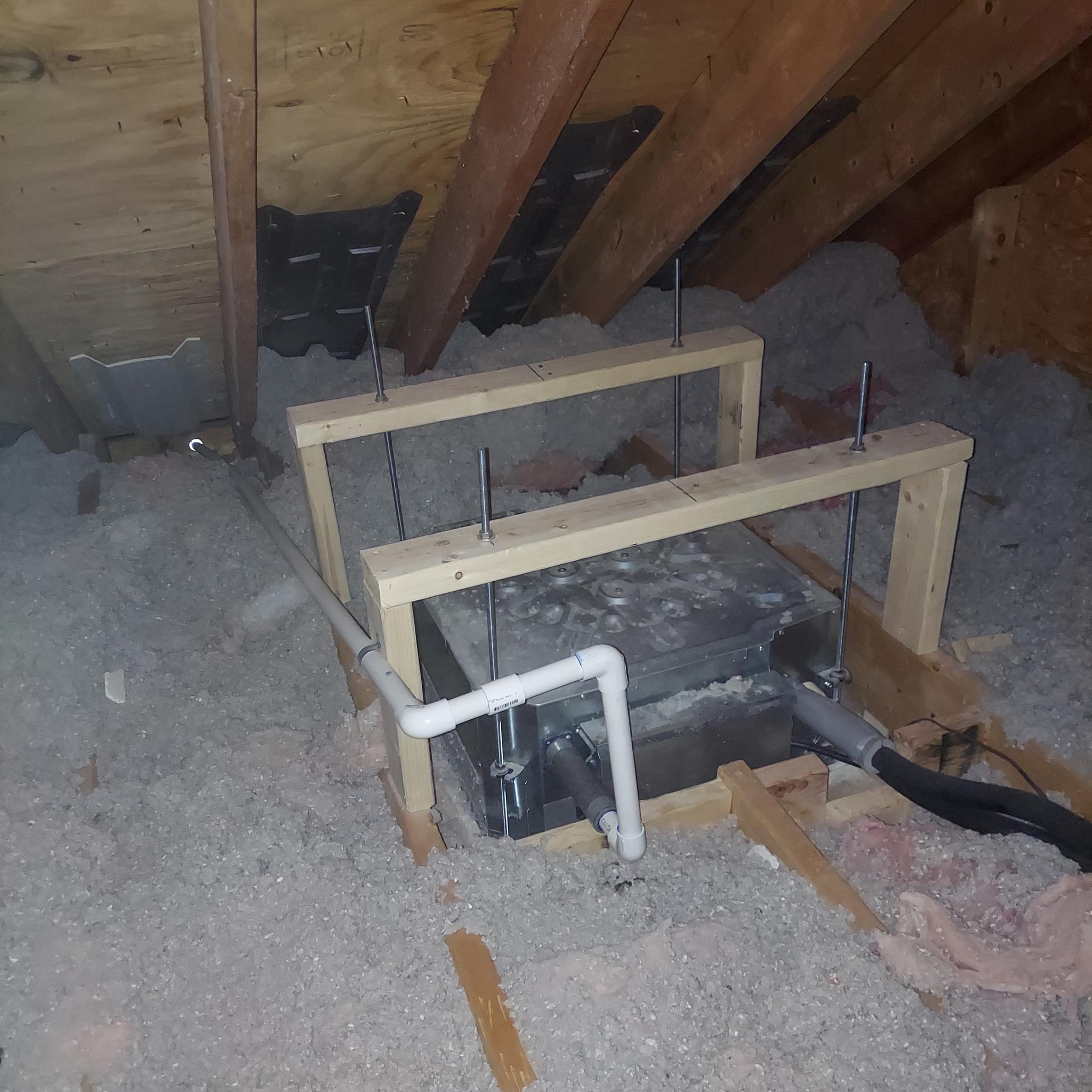This is what is on the flip-side of a ceiling cassette installation. We build a compact custom frame to suspend the unit into the attic or an above crawl space.
