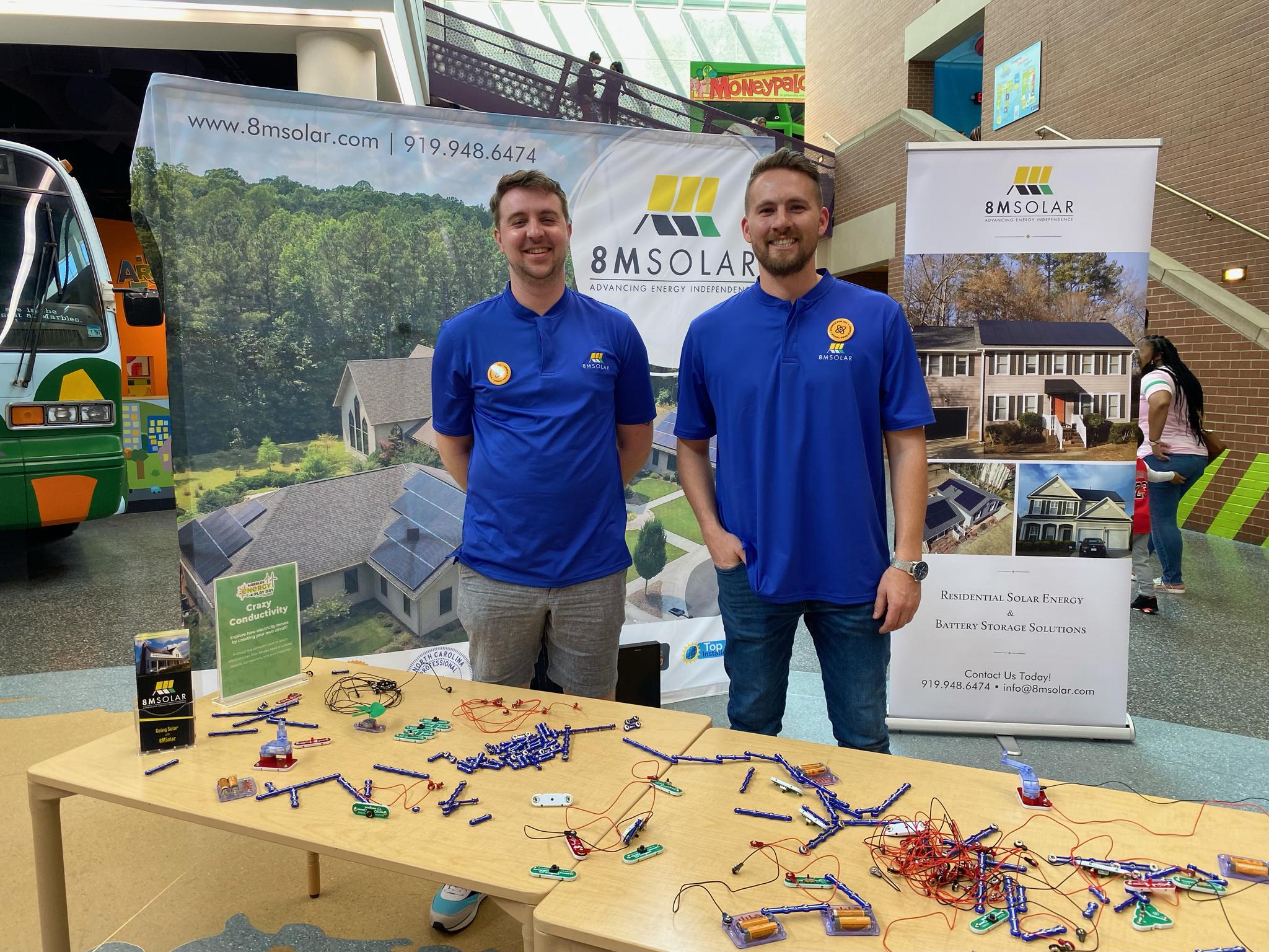 Two of our Sales Consultants at Marbles Science Museum, an event teaching kids about electricity and solar!