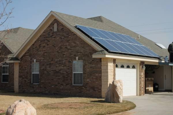 Solar panels on shingle roof
