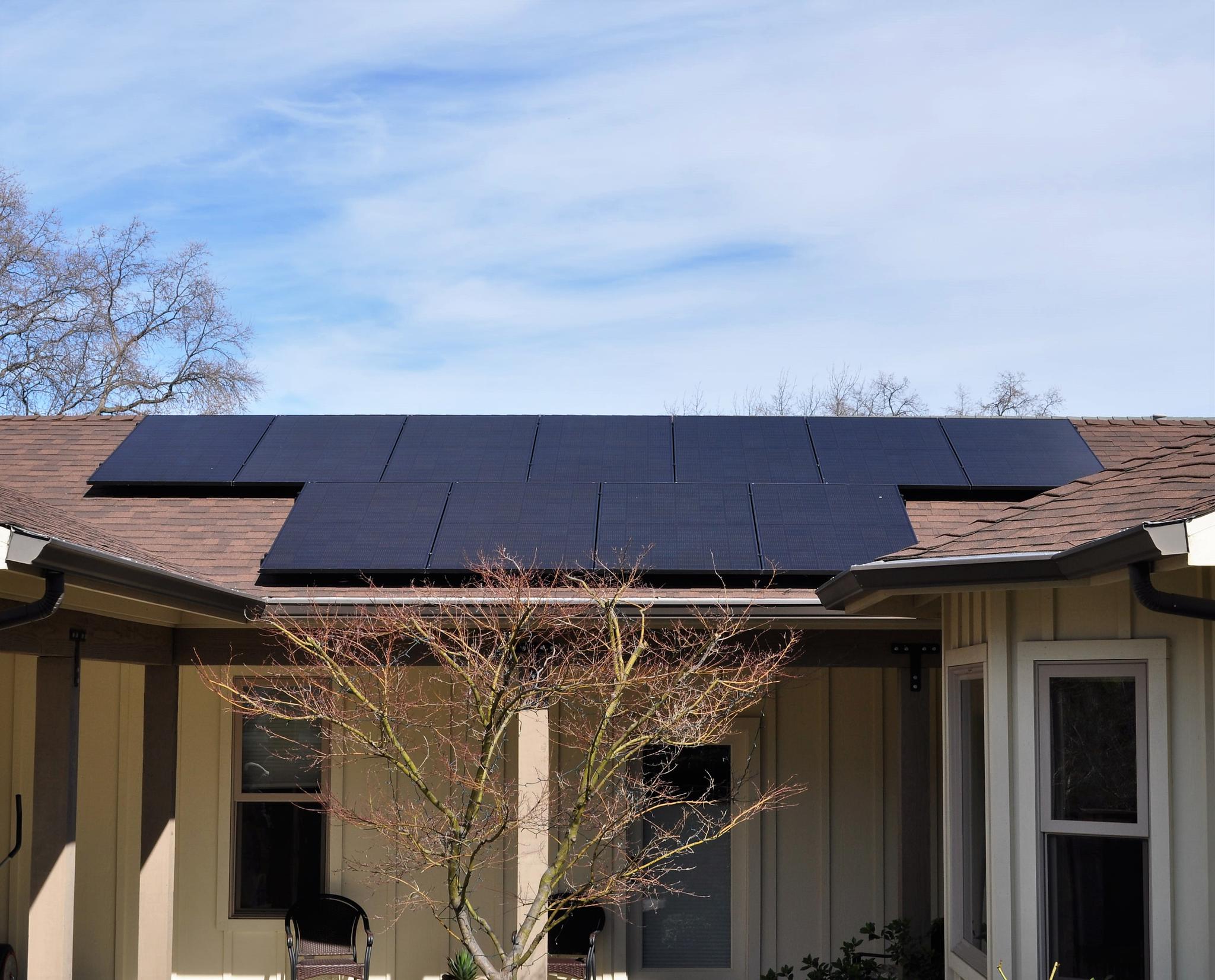 Black on black roof mount solar panels