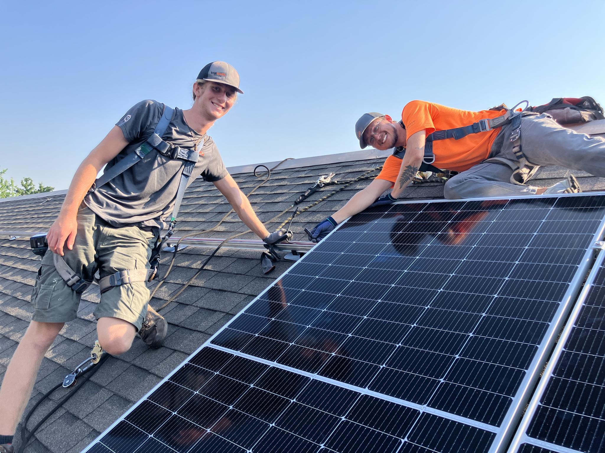 The True South Solar crew installing panels at a Methodist Church