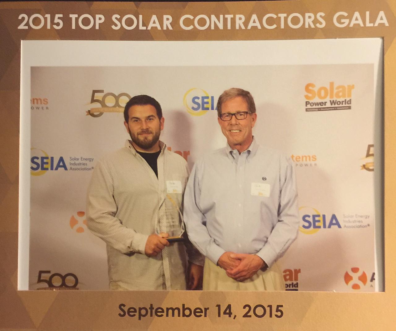 Accepting Top Solar Contractors Award