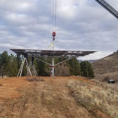Here we are craning in the sun tracker onto the support base