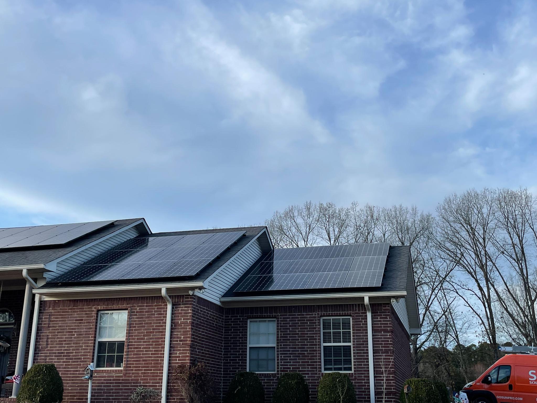 Panels on brick home