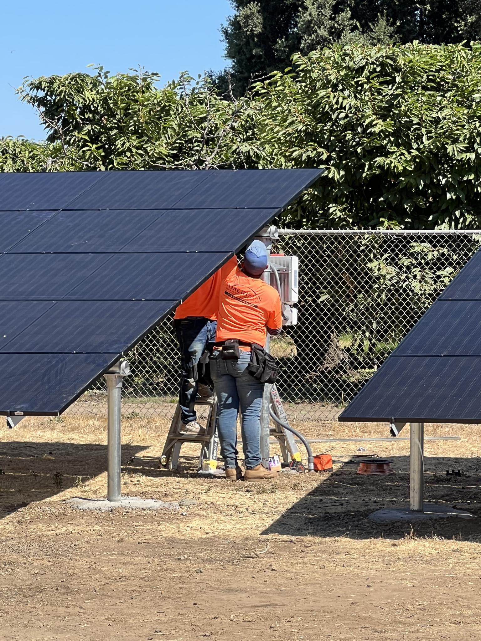 Team working to Install Ground Mount System