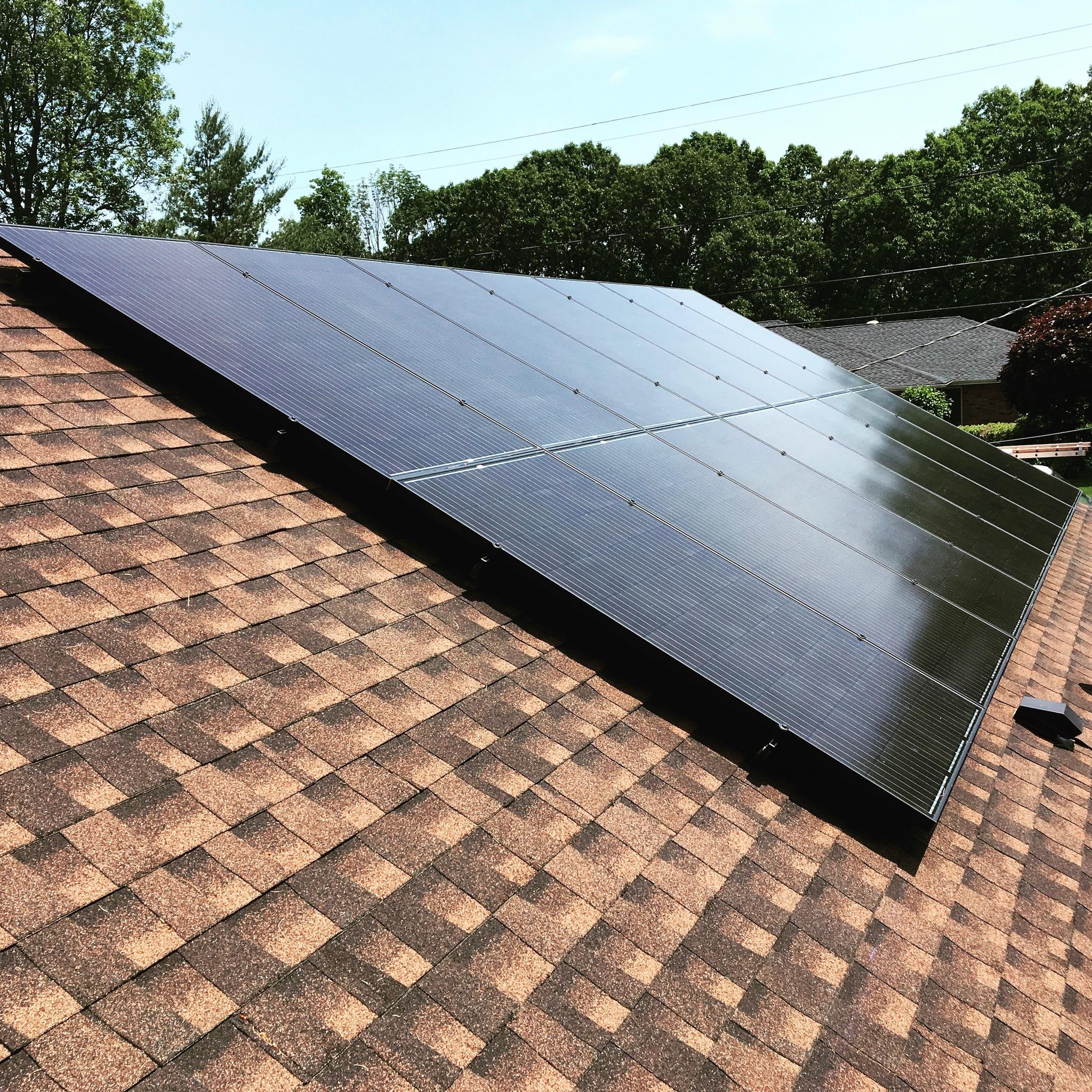 280 Trina Black on Black panels installed in Middlebury